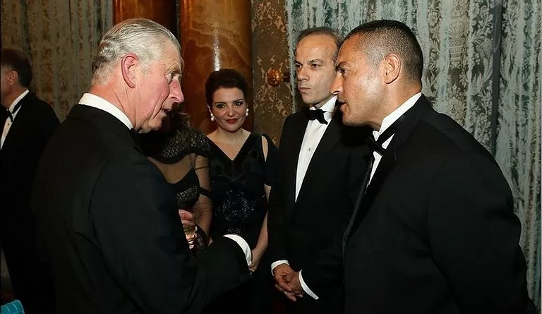 HRH Prince of Wales With John Christodoulou At Buckingham Palace in Support of Charity Event Dumfries House